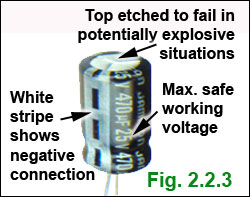 What are the markings on an electrolytic capacitor?